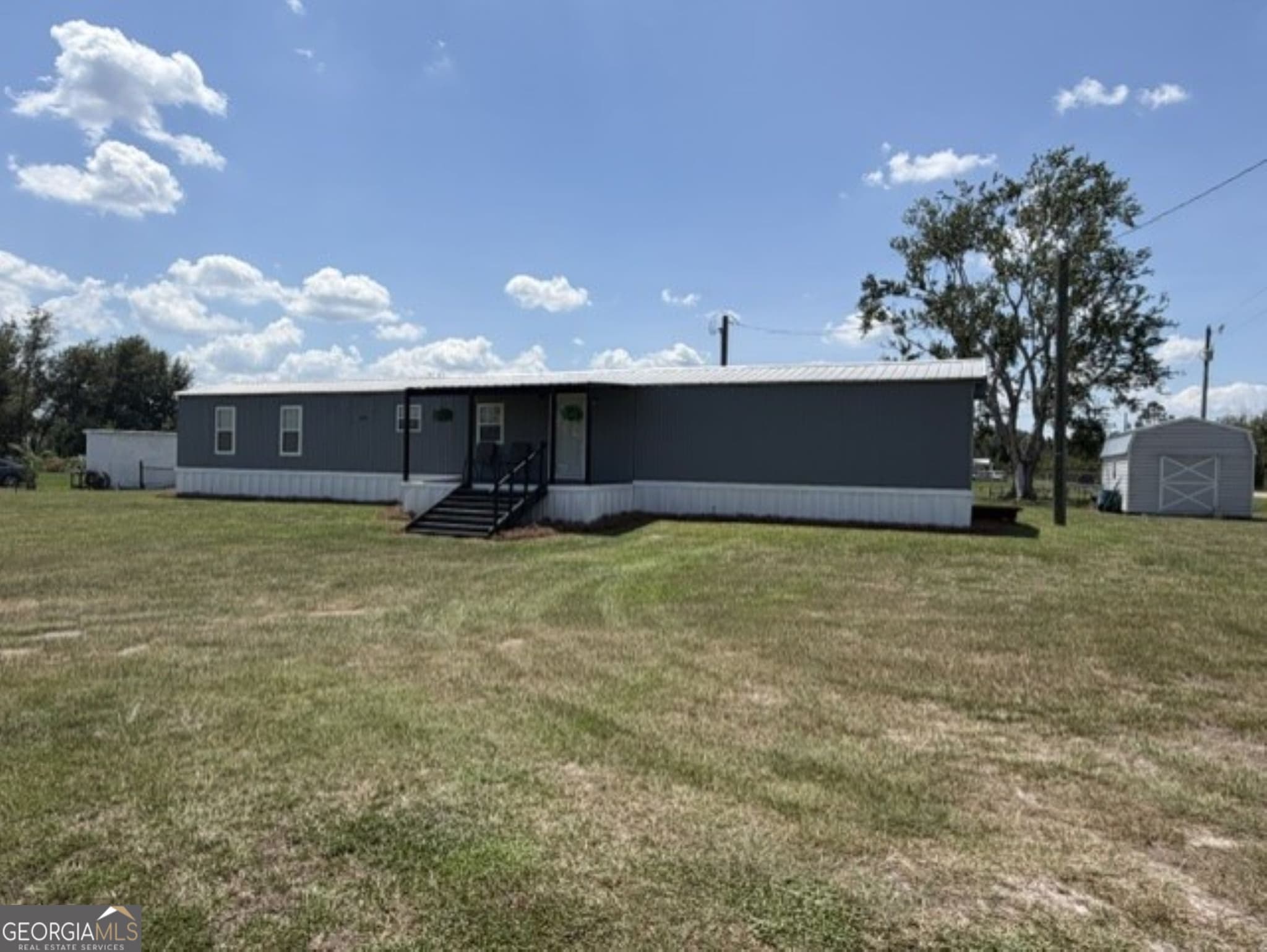 3 bedroom, 2 bathroom, 1,208 sq ft manufactured home,single family residence for sale at 264 Cuttings Loop Road, Homerville, GA 31634 — photo 2