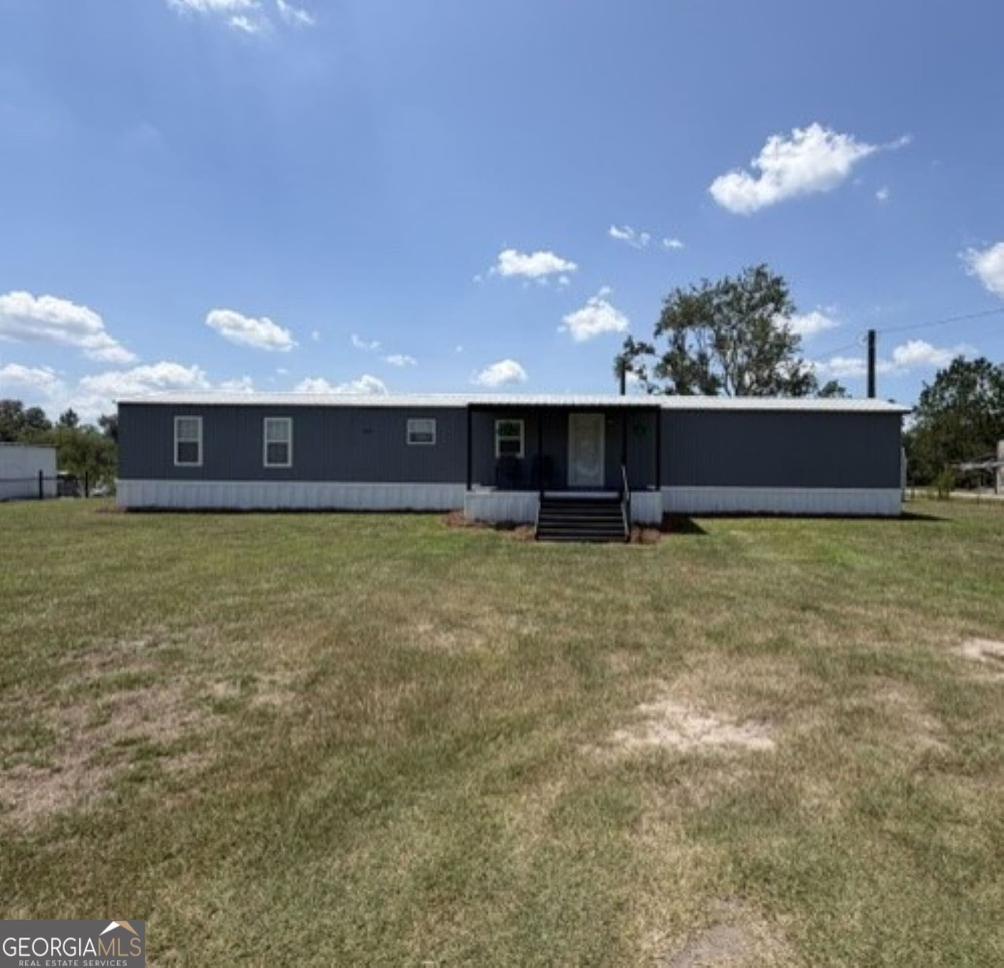 3 bedroom, 2 bathroom, 1,208 sq ft manufactured home,single family residence for sale at 264 Cuttings Loop Road, Homerville, GA 31634 — photo 3
