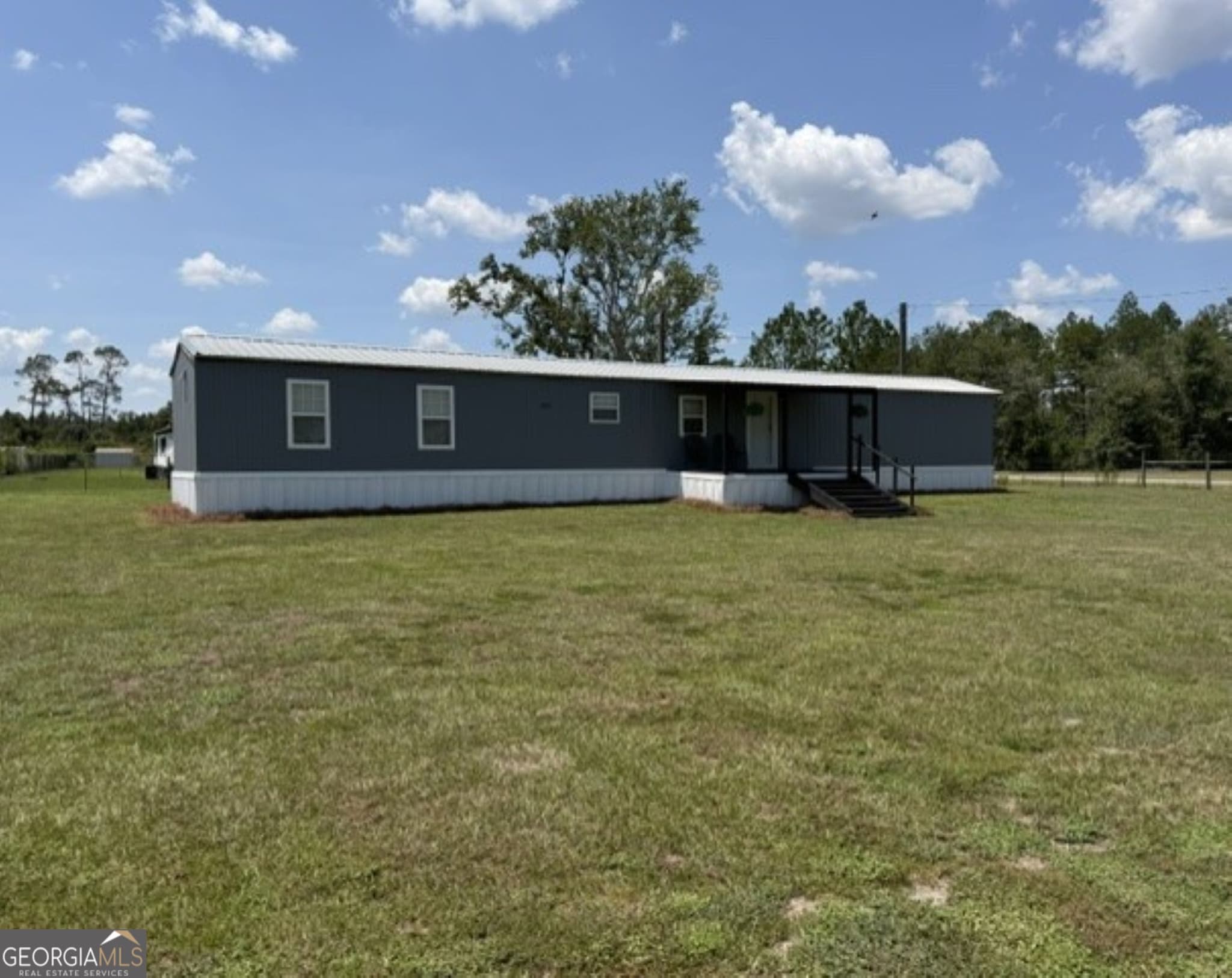 3 bedroom, 2 bathroom, 1,208 sq ft manufactured home,single family residence for sale at 264 Cuttings Loop Road, Homerville, GA 31634