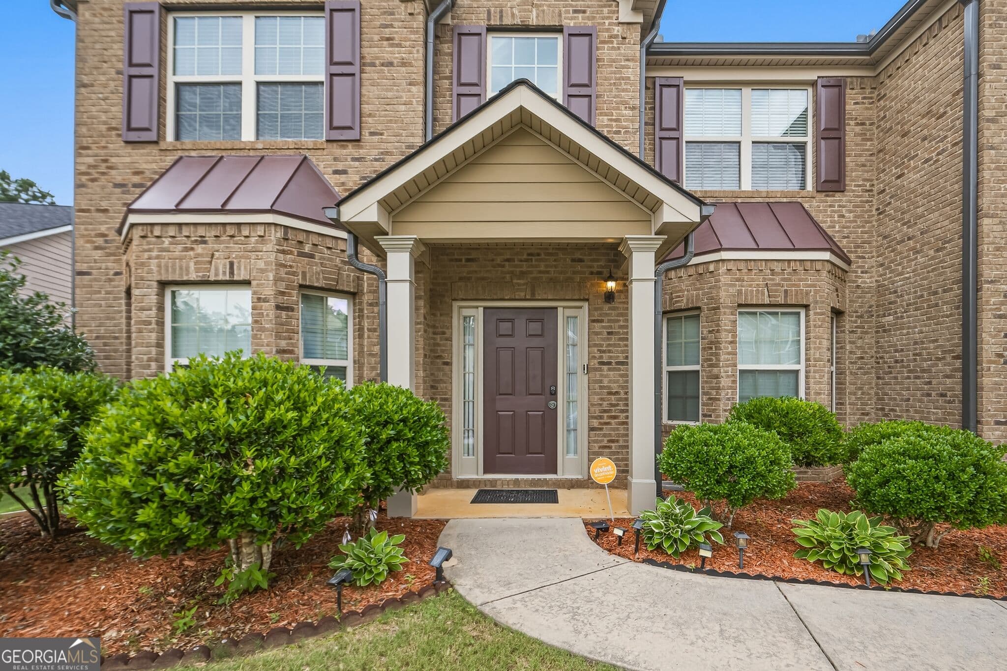 5 bedroom, 4 bathroom, 4,240 sq ft single family residence for sale at 5617 Dendy Trace, Fairburn, GA 30213 — photo 2