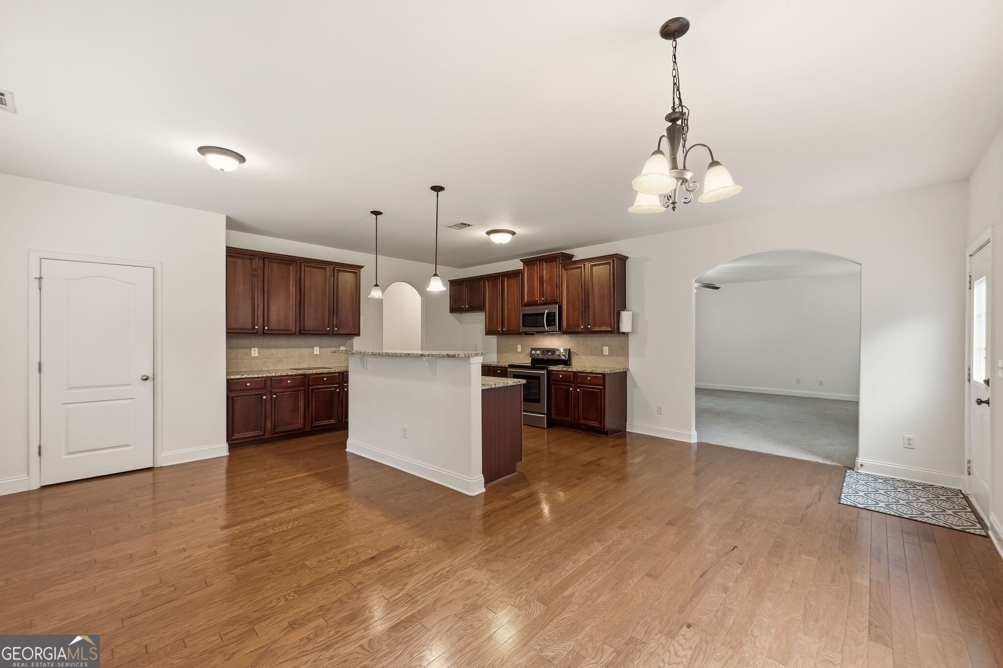 5 bedroom, 4 bathroom, 4,240 sq ft single family residence for sale at 5617 Dendy Trace, Fairburn, GA 30213 — photo 3