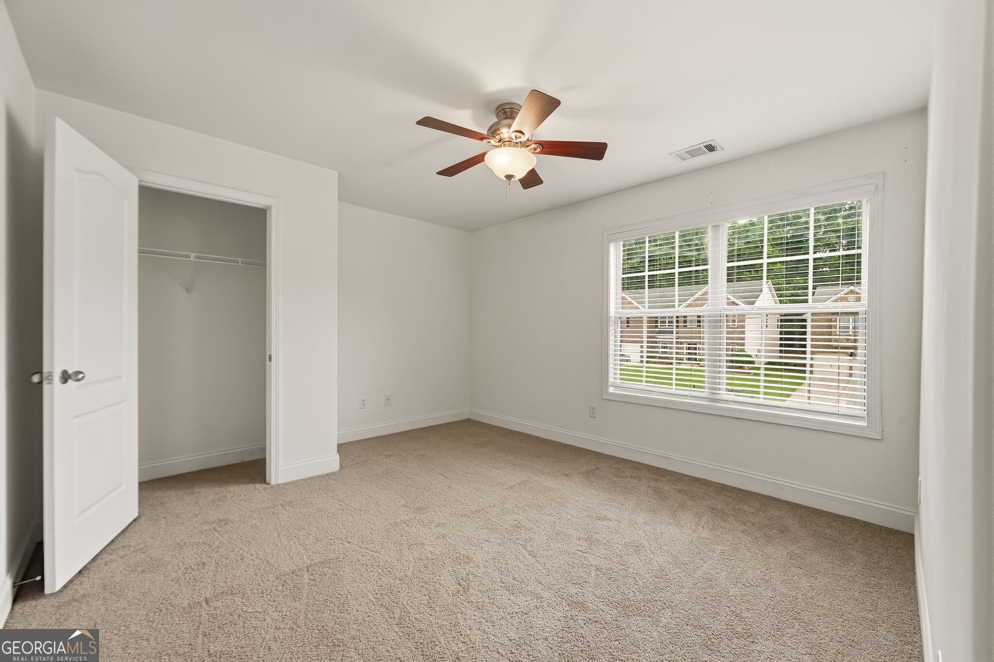 5 bedroom, 4 bathroom, 4,240 sq ft single family residence for sale at 5617 Dendy Trace, Fairburn, GA 30213 — photo 9