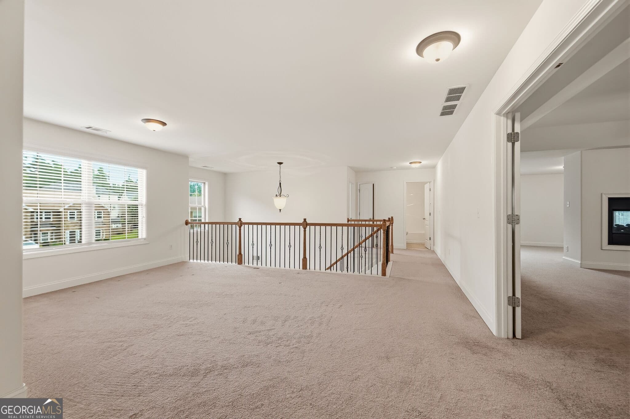5 bedroom, 4 bathroom, 4,240 sq ft single family residence for sale at 5617 Dendy Trace, Fairburn, GA 30213 — photo 4