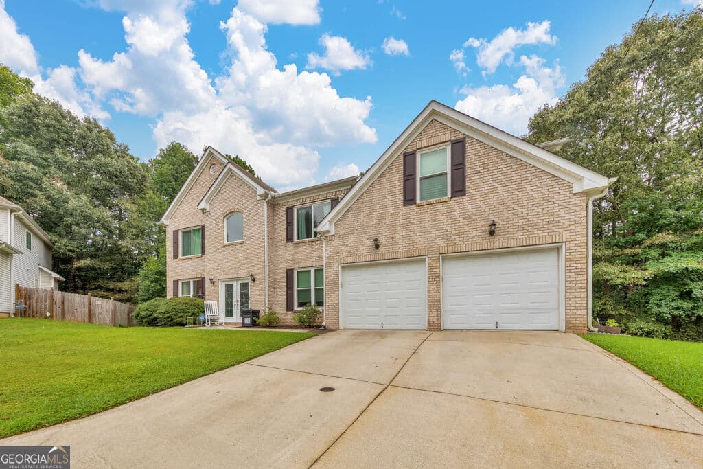 4 bedroom, 2.5 bathroom, 3,730 sq ft single family residence for sale at 7165 Blair Chase Court, Austell, GA 30168 — photo 2