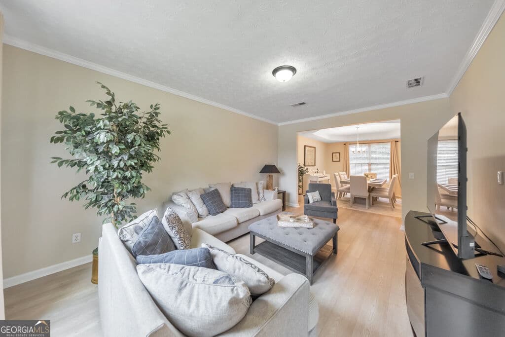 4 bedroom, 2.5 bathroom, 3,730 sq ft single family residence for sale at 7165 Blair Chase Court, Austell, GA 30168 — photo 6