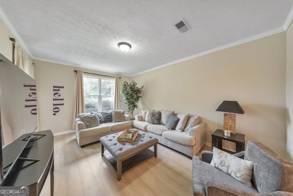 4 bedroom, 2.5 bathroom, 3,730 sq ft single family residence for sale at 7165 Blair Chase Court, Austell, GA 30168 — photo 7
