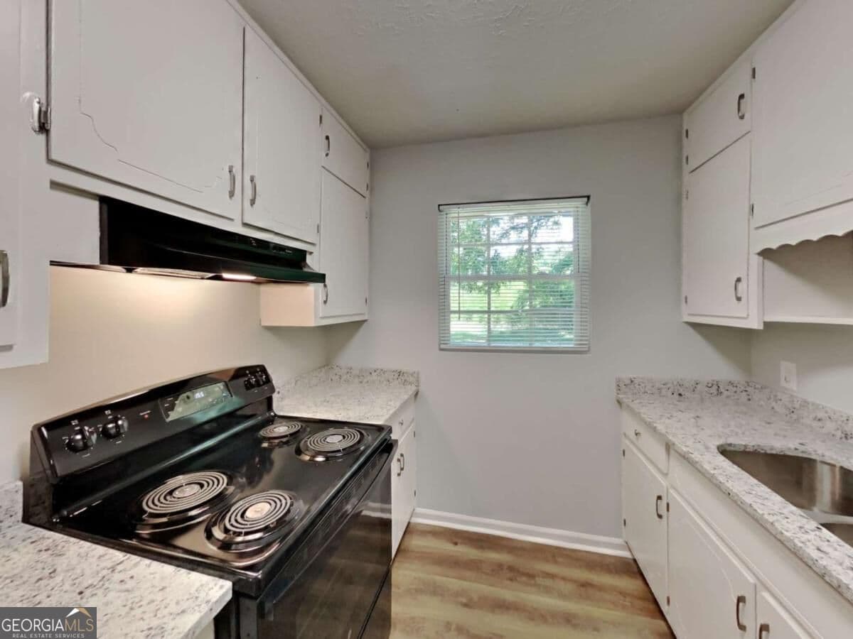 3 bedroom, 1 bathroom single family residence for rent at 555 Womack Road, Covington, GA 30016 for $1,570 a month — photo 2