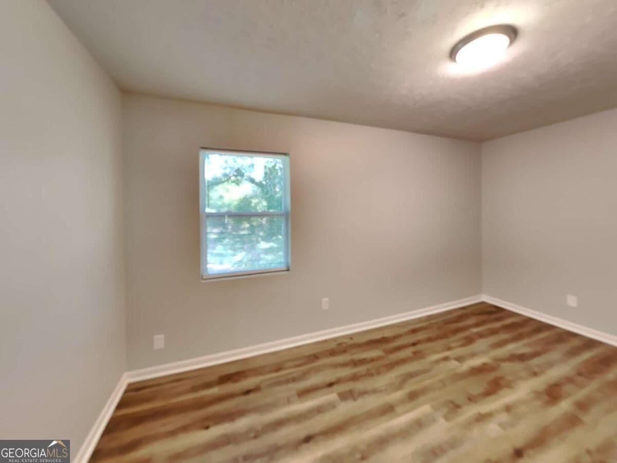 3 bedroom, 1 bathroom single family residence for rent at 555 Womack Road, Covington, GA 30016 for $1,570 a month — photo 6