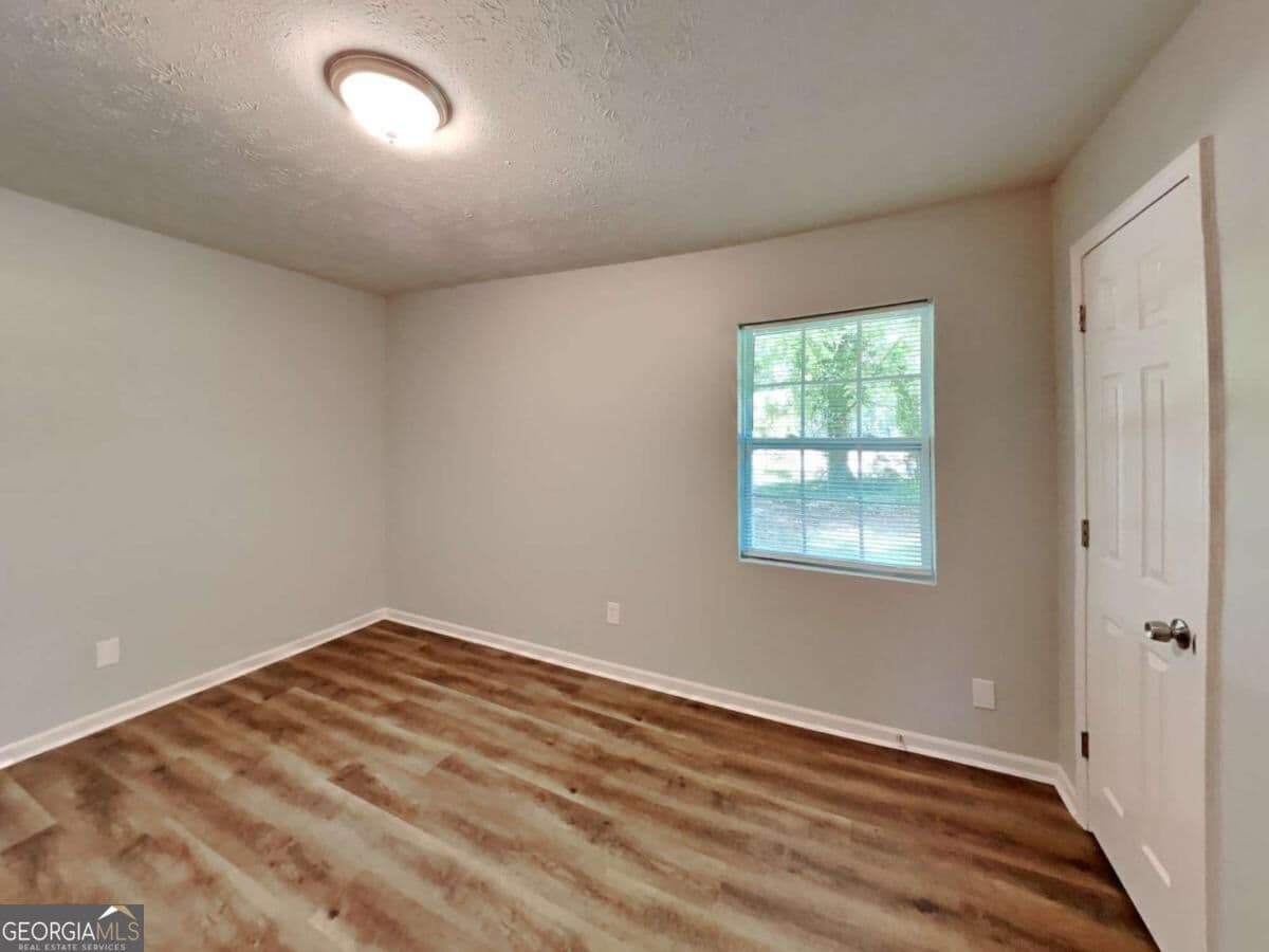 3 bedroom, 1 bathroom single family residence for rent at 555 Womack Road, Covington, GA 30016 for $1,570 a month — photo 7