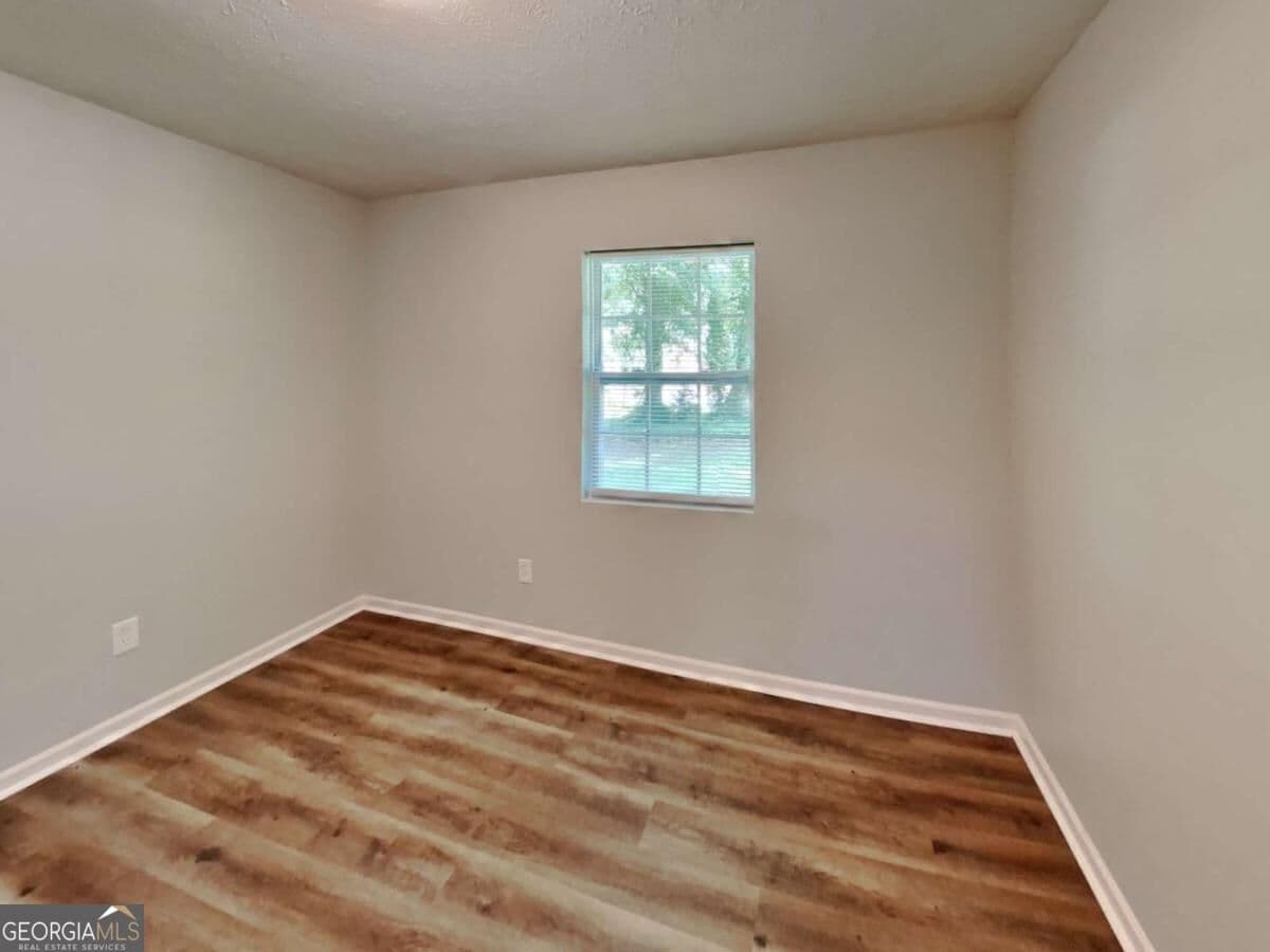 3 bedroom, 1 bathroom single family residence for rent at 555 Womack Road, Covington, GA 30016 for $1,570 a month — photo 5
