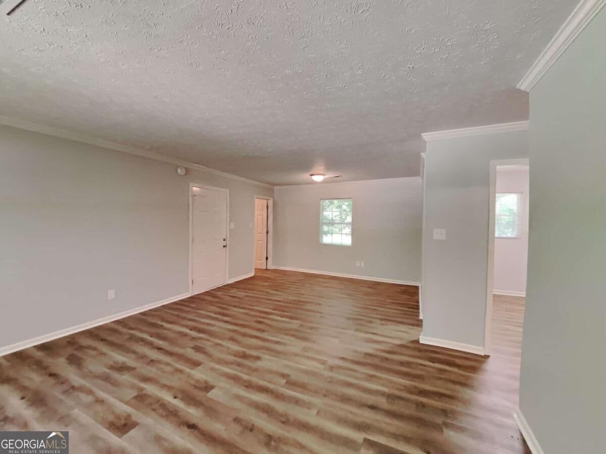 3 bedroom, 1 bathroom single family residence for rent at 555 Womack Road, Covington, GA 30016 for $1,570 a month — photo 4