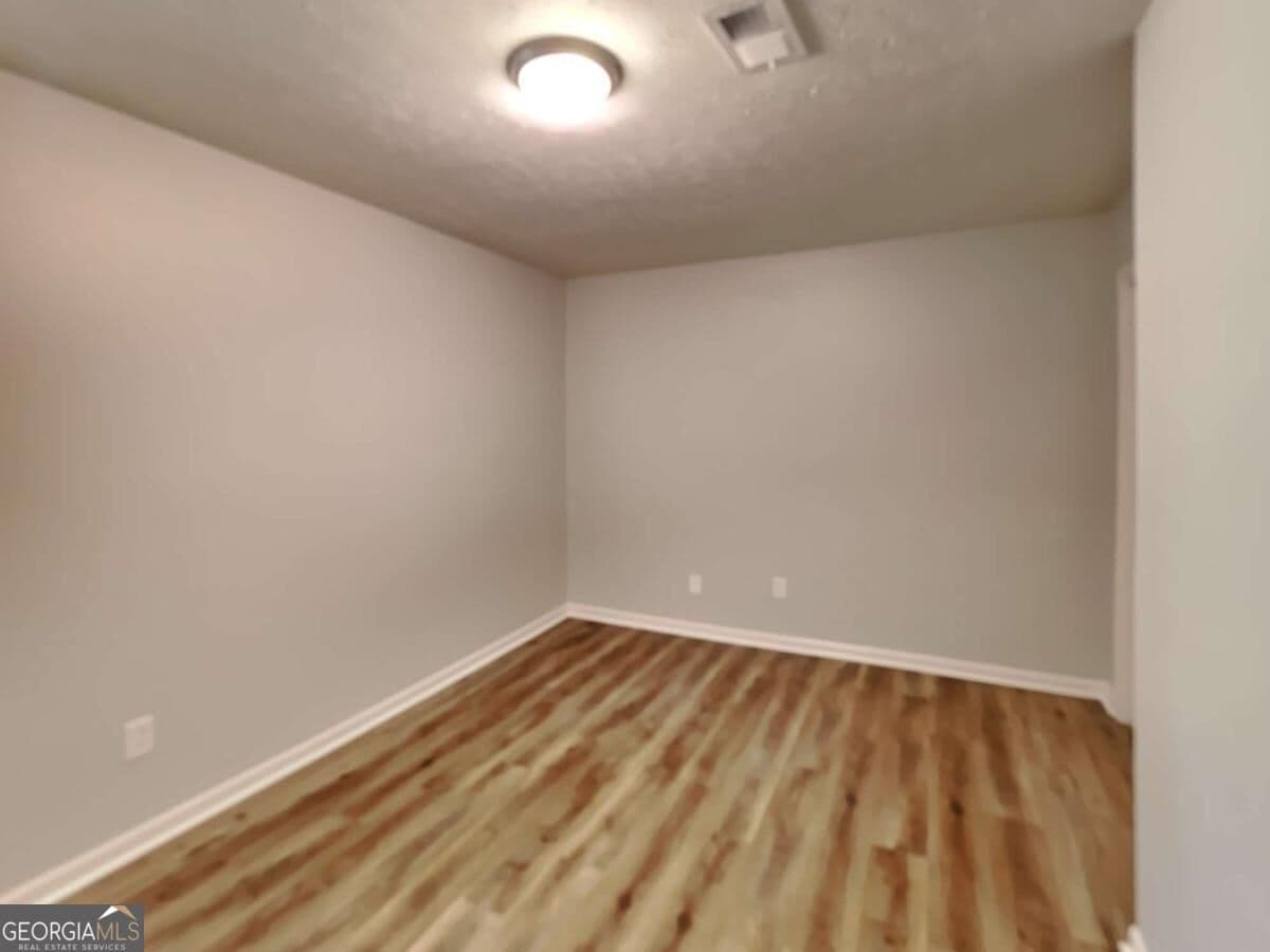 3 bedroom, 1 bathroom single family residence for rent at 555 Womack Road, Covington, GA 30016 for $1,570 a month — photo 8