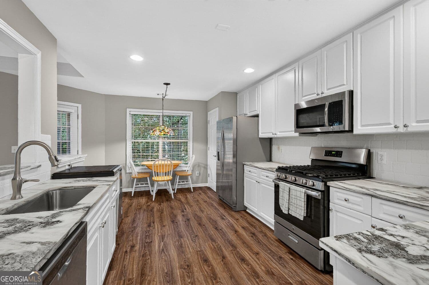 4 bedroom, 3 bathroom, 2,327 sq ft single family residence for sale at 1980 Lanier Heights Drive, Cumming, GA 30041 — photo 9