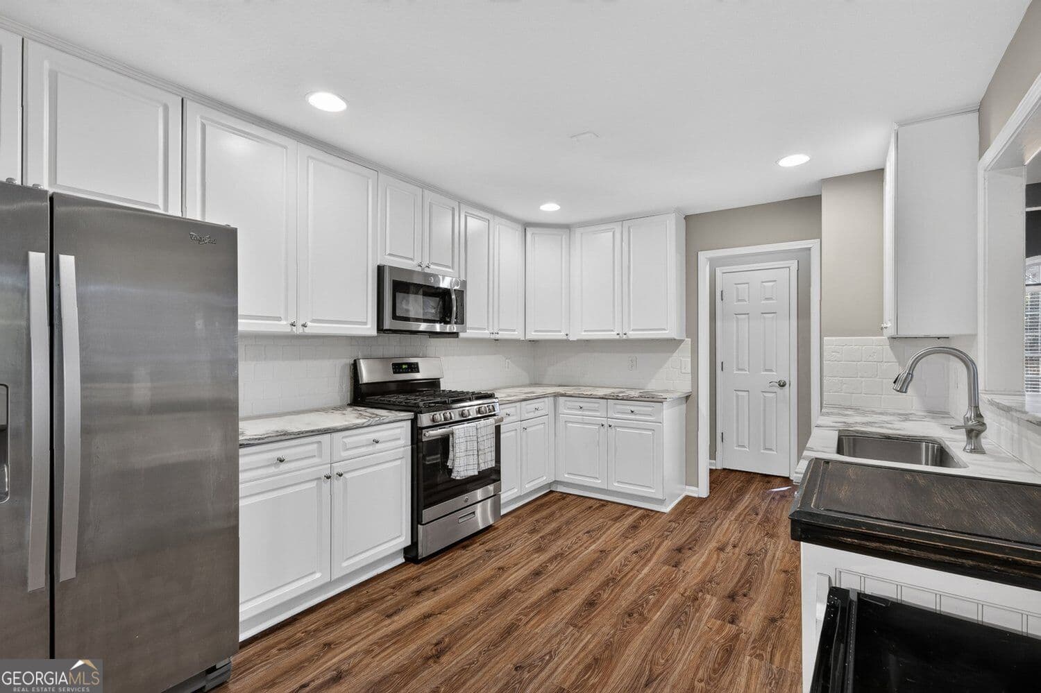 4 bedroom, 3 bathroom, 2,327 sq ft single family residence for sale at 1980 Lanier Heights Drive, Cumming, GA 30041 — photo 10