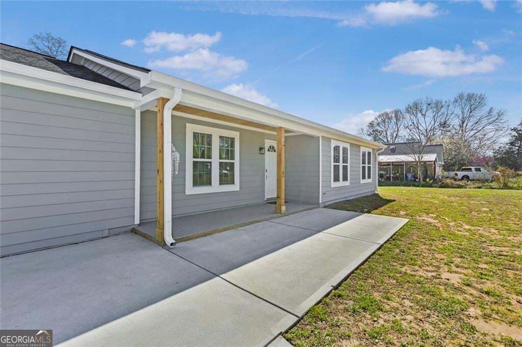 4 bedroom, 2 bathroom, 1,600 sq ft single family residence for sale at 2001 RAYMONDS Drive, Loganville, GA 30052 — photo 2