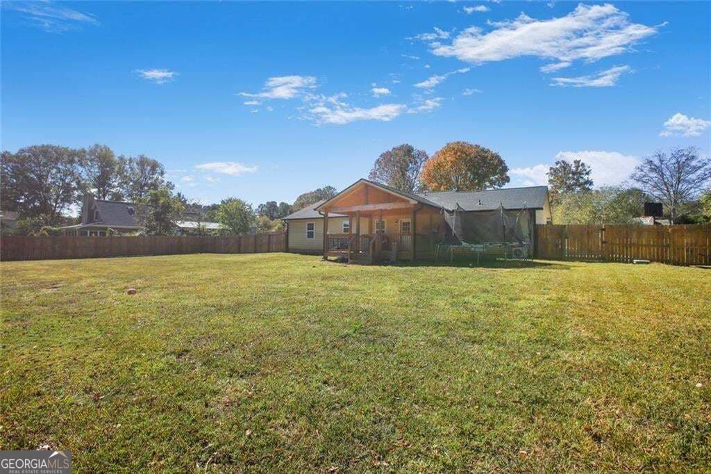 4 bedroom, 2 bathroom, 1,600 sq ft single family residence for sale at 2001 RAYMONDS Drive, Loganville, GA 30052 — photo 7