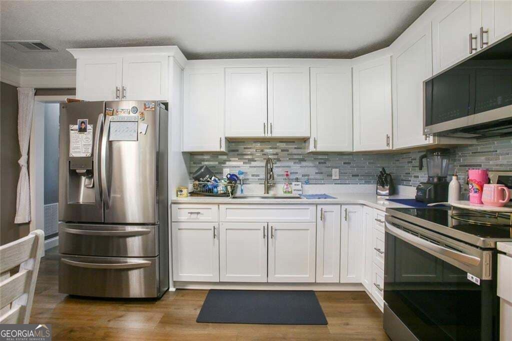 4 bedroom, 2 bathroom, 1,600 sq ft single family residence for sale at 2001 RAYMONDS Drive, Loganville, GA 30052 — photo 10