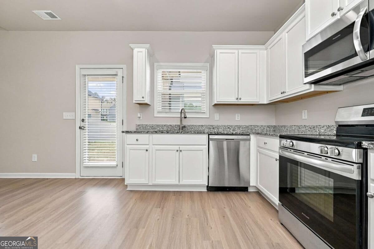 4 bedroom, 2 bathroom single family residence for rent at 130 Culver Street, Jackson, GA 30233 for $1,715 a month — photo 2