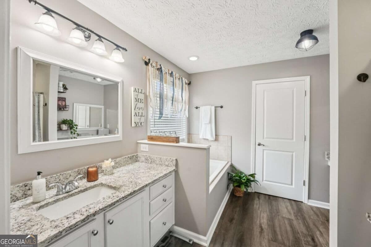 5 bedroom, 3 bathroom, 3,660 sq ft single family residence for sale at 6471 Forsyth Drive, Cumming, GA 30028 — photo 7