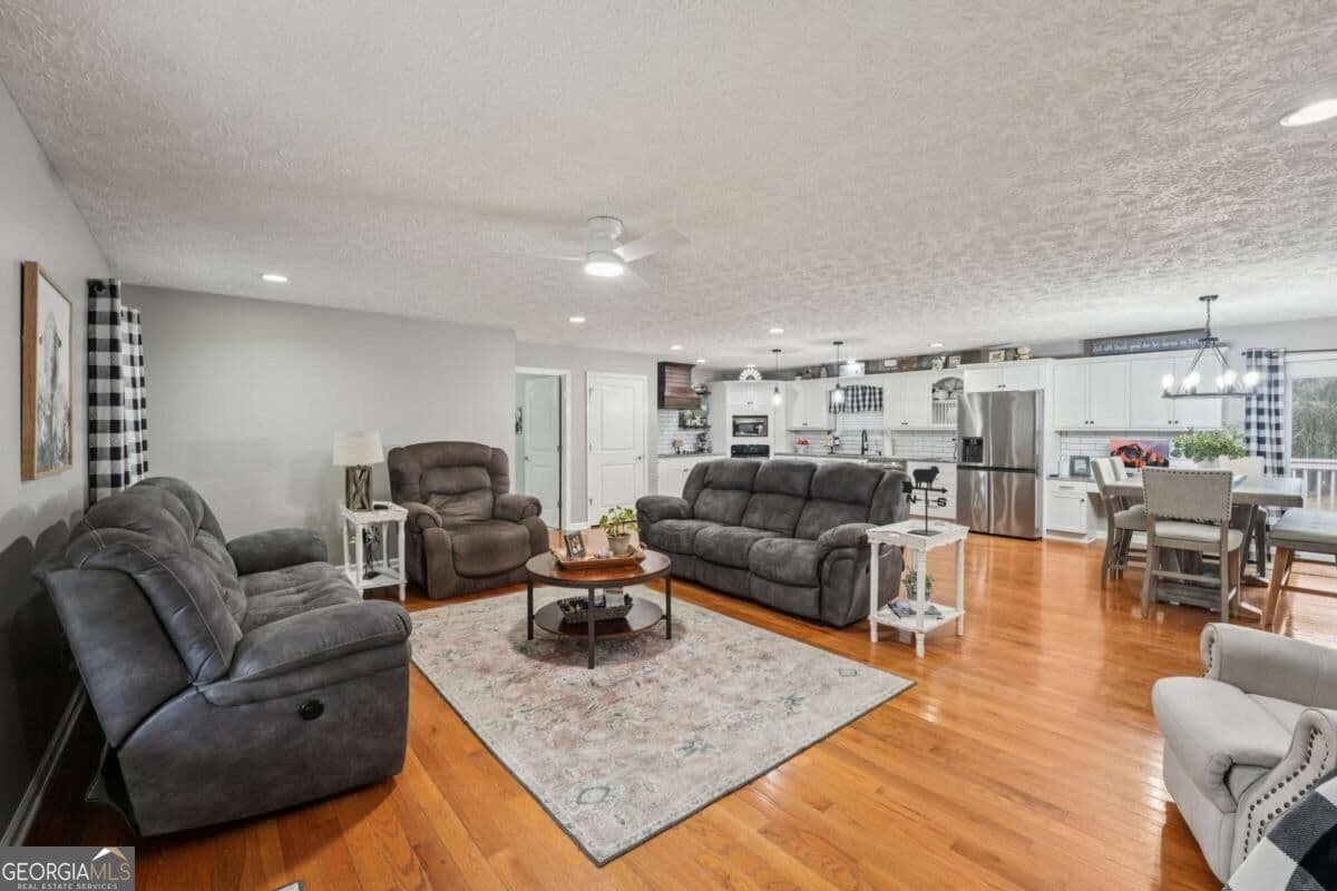 5 bedroom, 3 bathroom, 3,660 sq ft single family residence for sale at 6471 Forsyth Drive, Cumming, GA 30028 — photo 5