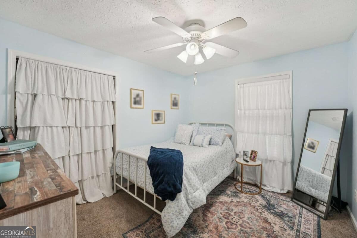5 bedroom, 3 bathroom, 3,660 sq ft single family residence for sale at 6471 Forsyth Drive, Cumming, GA 30028 — photo 9