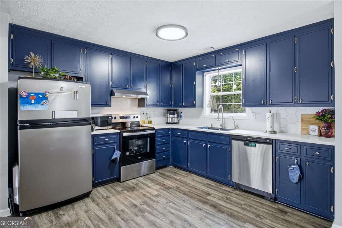 5 bedroom, 3 bathroom, 2,209 sq ft single family residence for sale at 326 Golden Rod Lane, Auburn, GA 30011 — photo 10