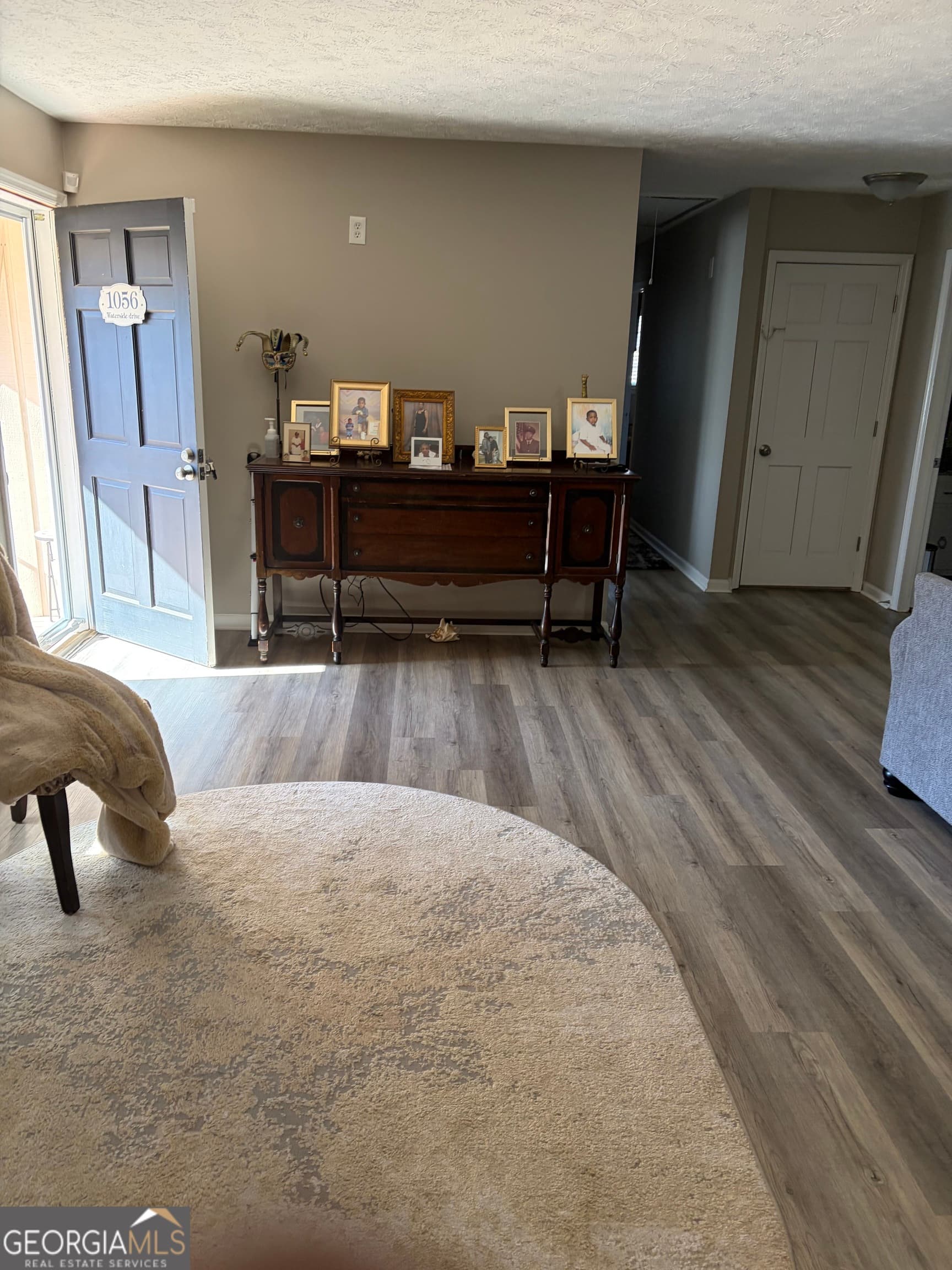 3 bedroom, 2 bathroom, 1,668 sq ft single family residence for sale at 1056 Waterside Drive, Conyers, GA 30013 — photo 2