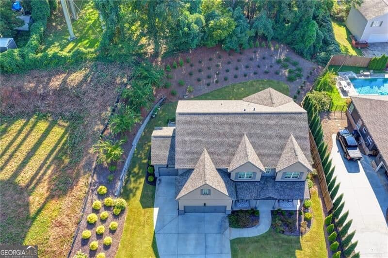 5 bedroom, 4.5 bathroom, 4,029 sq ft single family residence for sale at 357 S Alexander Street, Buford, GA 30518 — photo 7