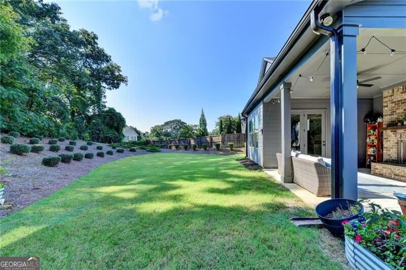 5 bedroom, 4.5 bathroom, 4,029 sq ft single family residence for sale at 357 S Alexander Street, Buford, GA 30518 — photo 3