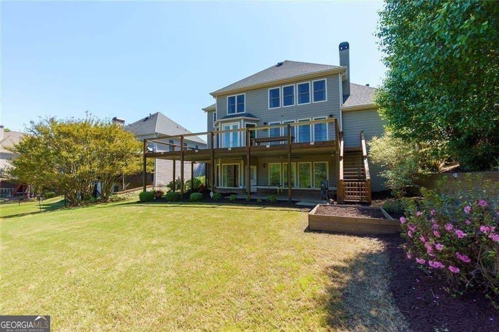5 bedroom, 3.5 bathroom, 4,242 sq ft single family residence for sale at 140 Waterstone Pointe, Acworth, GA 30101 — photo 2