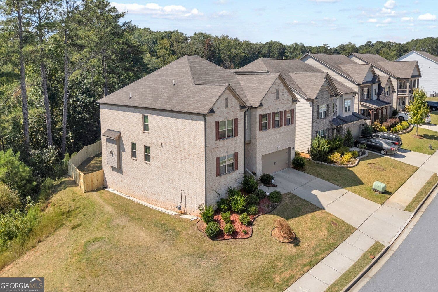 5 bedroom, 5 bathroom, 4,960 sq ft single family residence for sale at 327 Round Pond Drive, Lilburn, GA 30047 — photo 2