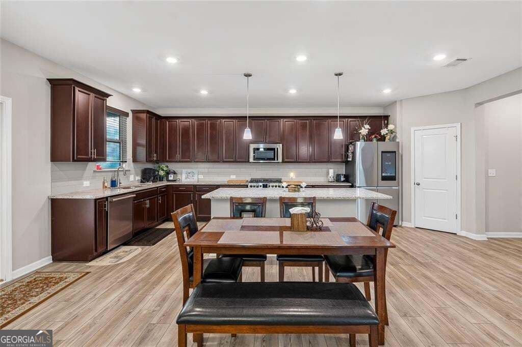 5 bedroom, 5 bathroom, 4,960 sq ft single family residence for sale at 327 Round Pond Drive, Lilburn, GA 30047 — photo 6