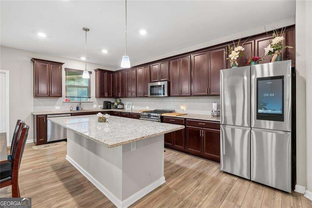 5 bedroom, 5 bathroom, 4,960 sq ft single family residence for sale at 327 Round Pond Drive, Lilburn, GA 30047 — photo 7