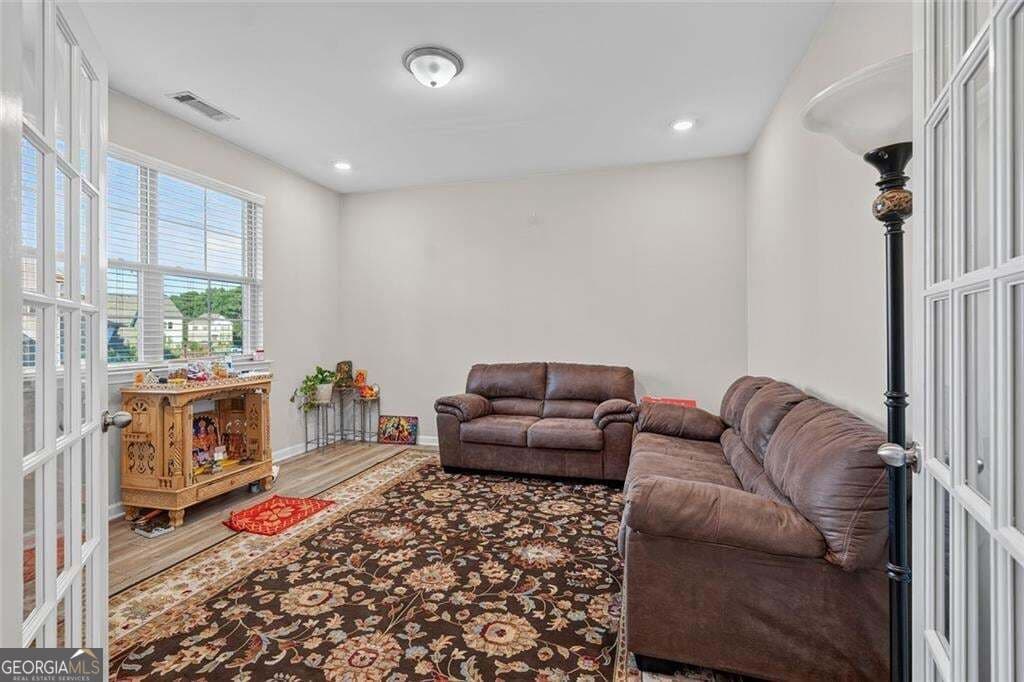 5 bedroom, 5 bathroom, 4,960 sq ft single family residence for sale at 327 Round Pond Drive, Lilburn, GA 30047 — photo 3