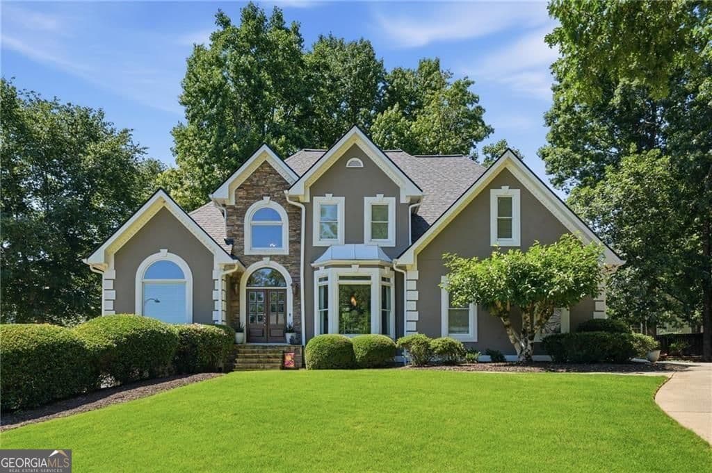 6 bedroom, 4.5 bathroom, 5,252 sq ft single family residence sold at 520 Estate Club Circle, Roswell, GA 30075