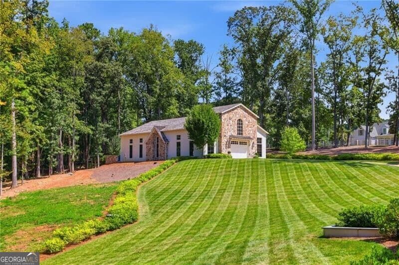 6 bedroom, 7.5 bathroom, 12,559 sq ft single family residence for sale at 2450 Kirk Lane, Kennesaw, GA 30152 — photo 7