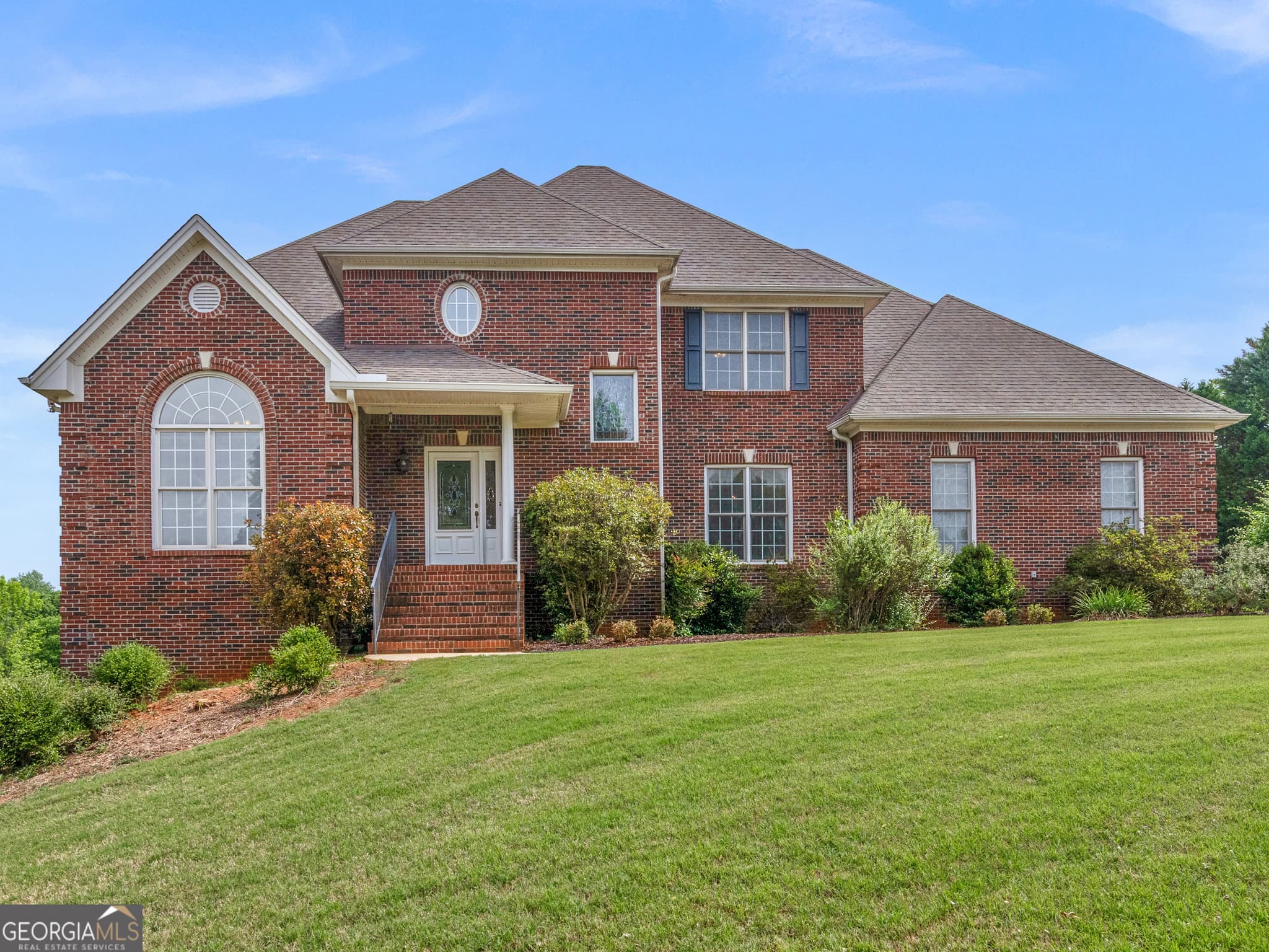 4 bedroom, 4.5 bathroom, 6,250 sq ft single family residence for sale at 1302 Chester Place, Mcdonough, GA 30252 — photo 1 of 34