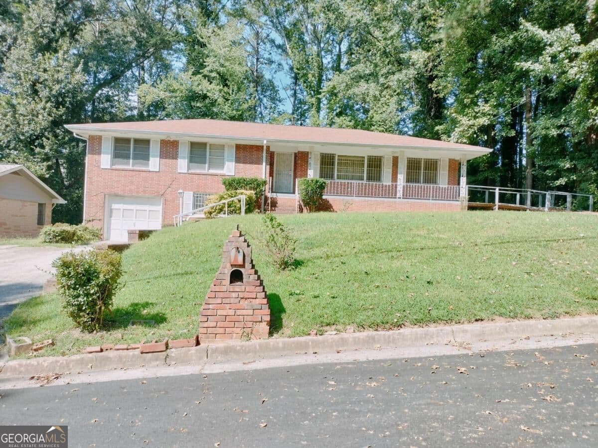 4 bedroom, 3 bathroom, 2,980 sq ft single family residence for sale at 2641 Hedgewood Lane, Atlanta, GA 30311 — photo 1 of 72