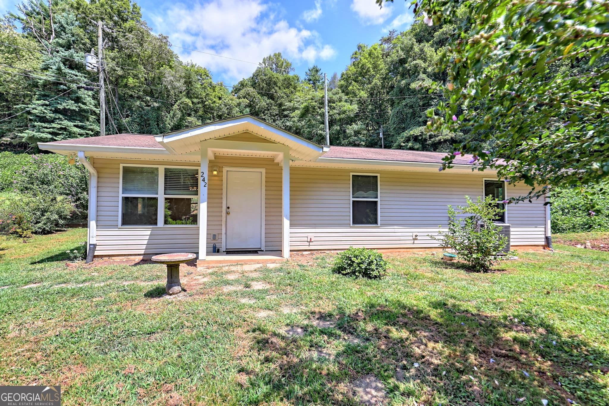 2 bedroom, 2 bathroom, 1,056 sq ft single family residence for sale at 242 Old Chechero Road, Clayton, GA 30525 — photo 1 of 25