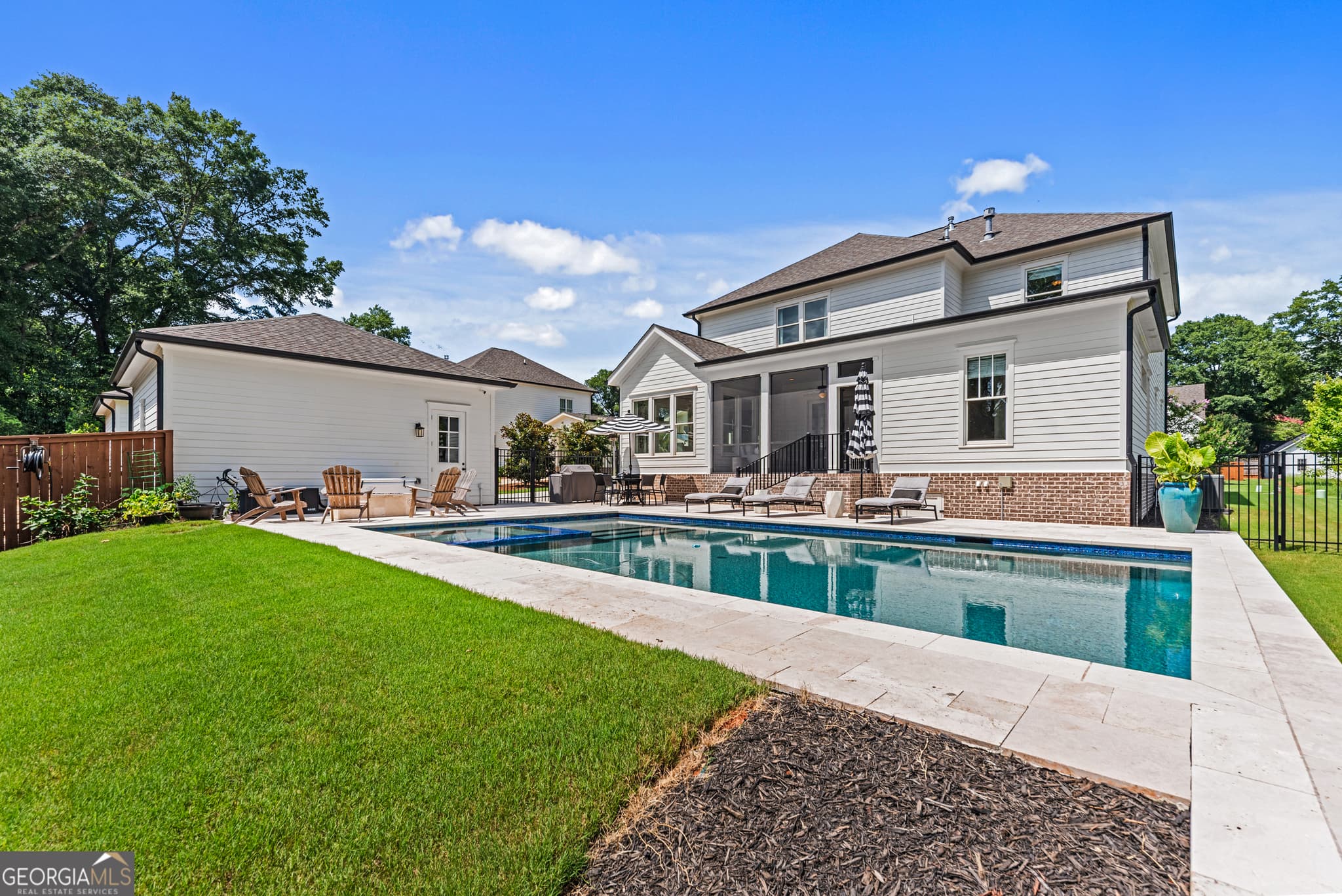 4 bedroom, 4.5 bathroom, 3,444 sq ft single family residence for sale at 661 Foster Park Lane, Madison, GA 30650 — photo 2