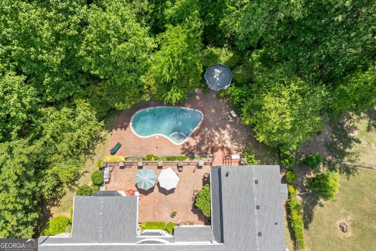 5 bedroom, 6 bathroom, 5,856 sq ft single family residence for sale at 4610 Orkney Lane, Atlanta, GA 30331 — photo 3