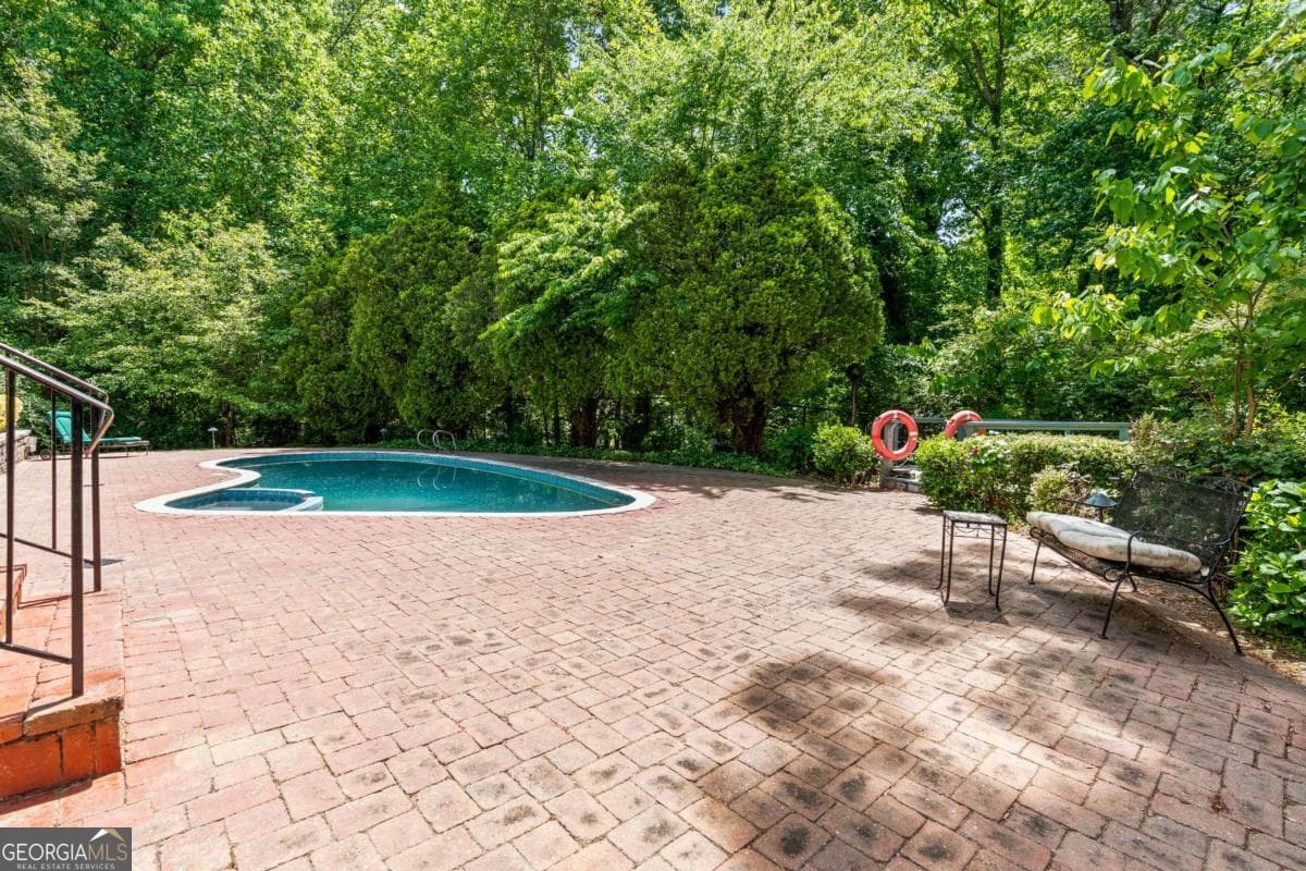 5 bedroom, 6 bathroom, 5,856 sq ft single family residence for sale at 4610 Orkney Lane, Atlanta, GA 30331 — photo 5