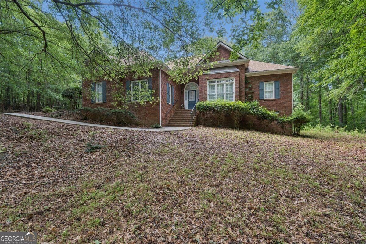 3 bedroom, 2.5 bathroom, 2,301 sq ft single family residence for sale at 971 Cochran Road, Covington, GA 30014 — photo 1 of 26