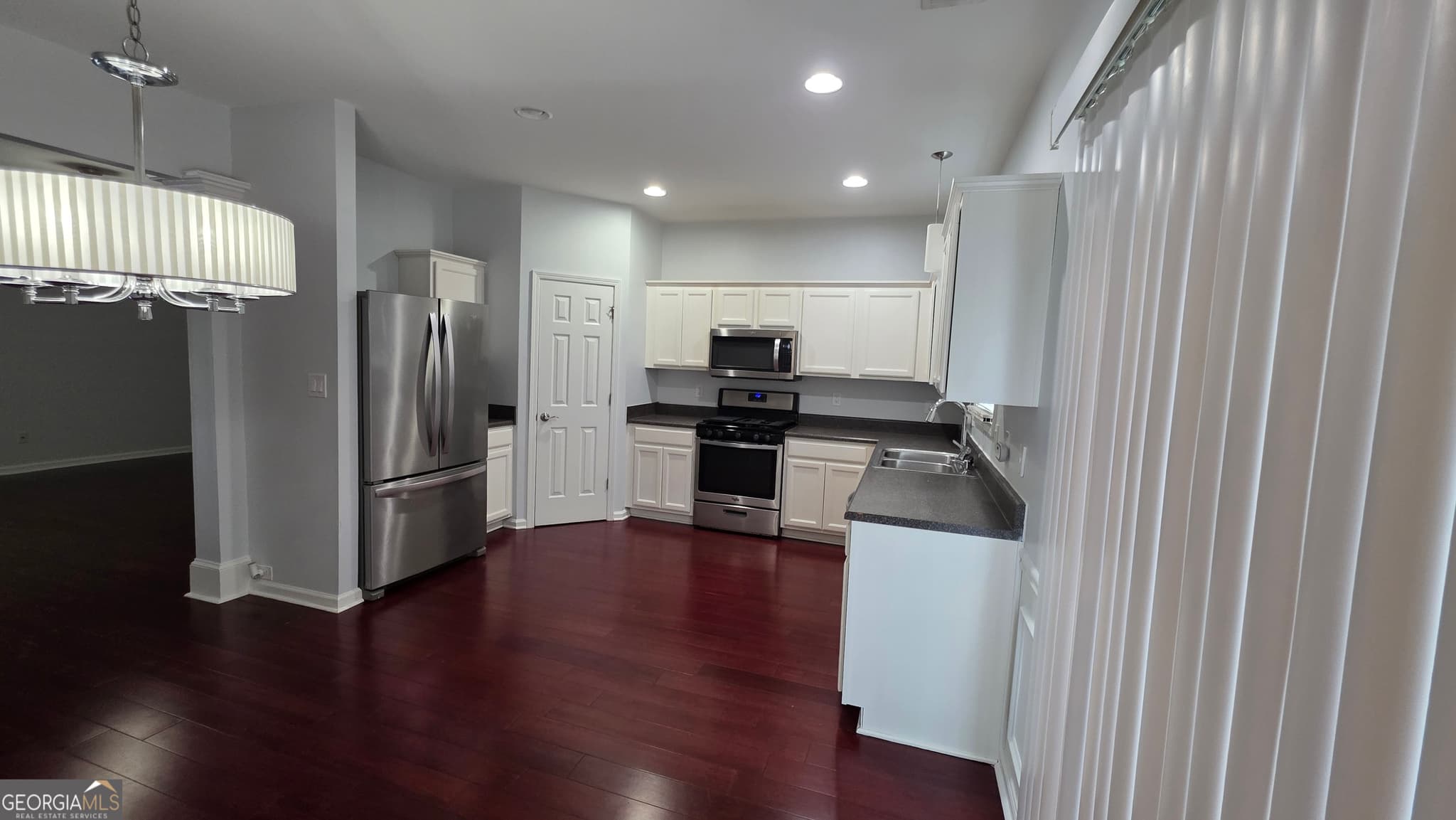 3 bedroom, 2.5 bathroom, 1,696 sq ft townhouse for sale at 3169 Milling Place, Duluth, GA 30096 — photo 4