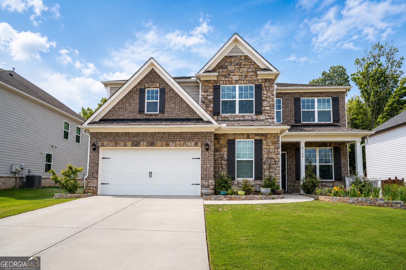 5 bedroom, 3 bathroom, 3,833 sq ft single family residence sold at 5165 Adirondack Drive, Cumming, GA 30040