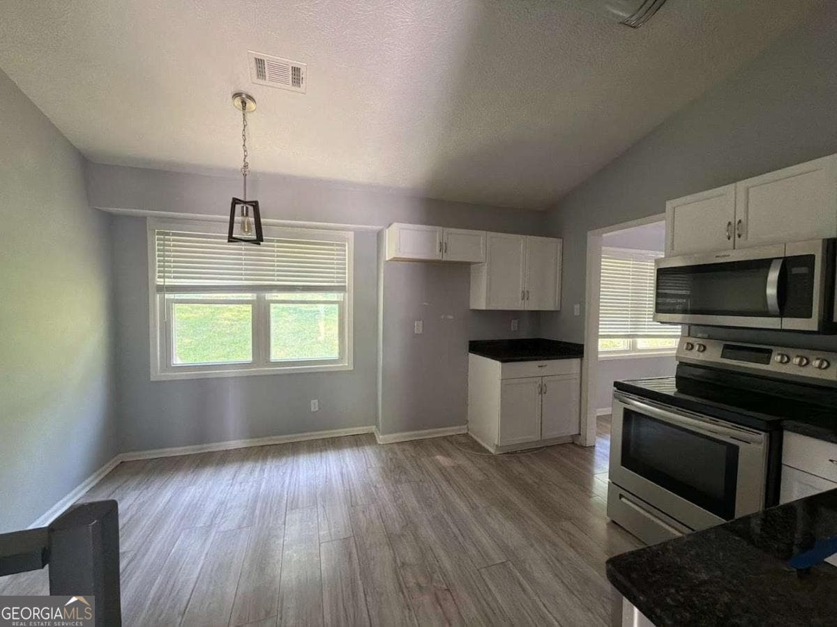 3 bedroom, 2 bathroom, 1,682 sq ft single family residence for sale at 6339 Phillips Creek Drive, Lithonia, GA 30058 — photo 3