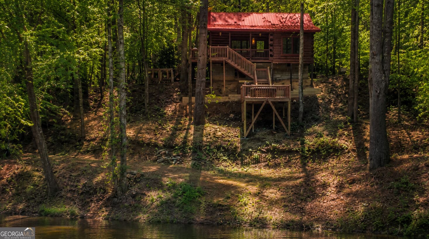 2 bedroom, 2 bathroom, 1,000 sq ft cabin,single family residence for sale at 4057 Whitepath Road, Ellijay, GA 30540 — photo 1 of 52
