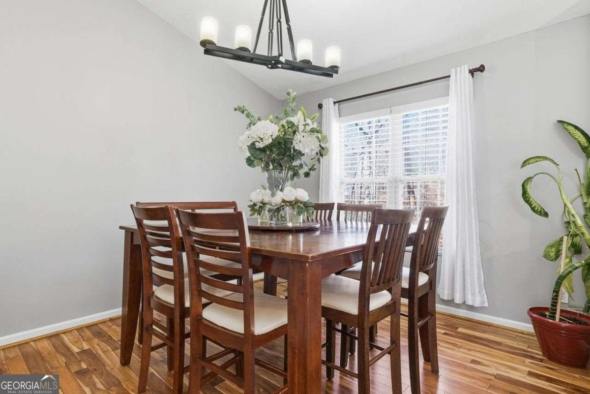 4 bedroom, 3 bathroom, 1,679 sq ft single family residence for sale at 8675 Bayhill Drive, Gainesville, GA 30506 — photo 2