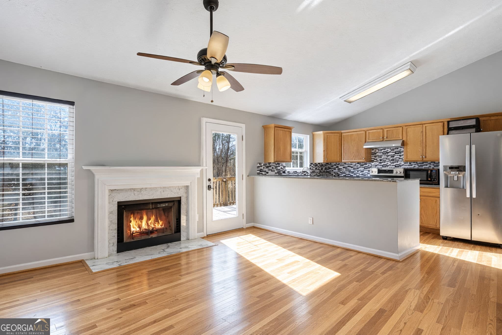 4 bedroom, 3 bathroom, 1,679 sq ft single family residence for sale at 8675 Bayhill Drive, Gainesville, GA 30506 — photo 6