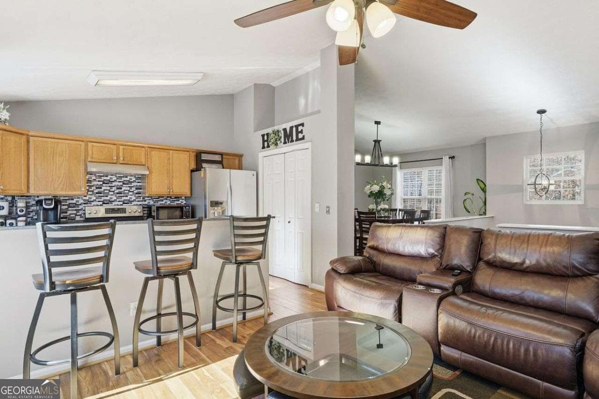 4 bedroom, 3 bathroom, 1,679 sq ft single family residence for sale at 8675 Bayhill Drive, Gainesville, GA 30506 — photo 7